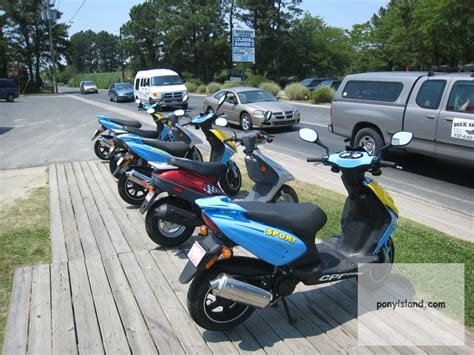 This is a review for bike rentals near Chincoteague Island, VA: "Brothers Ron and Wayne were great. We have been coming to Chincoteague for over 30 years and rented many a scooter. This is the best scooter rental experience we've had here! Ron got us in and out quickly. Wayne made an emergency run when one of our scooters ran out of gas (faulty .... 