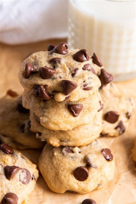 Chocolate chip cookies without baking soda. Preheat the oven to 350 °F (175 °C). Line a baking sheet with a piece of parchment paper. In a large mixing bowl with a stand mixer, beat together the butter, brown and granulated sugars until light and fluffy. Beat in the yogurt and vanilla until well combined. 