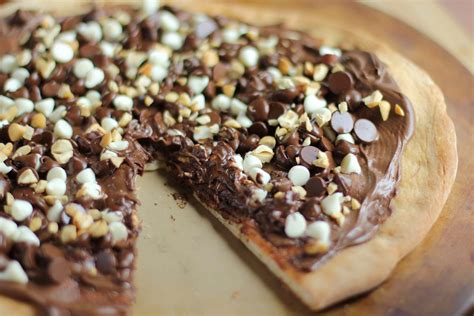 Chocolate pizza. PIZZA · 11 ounces (312 g) pizza dough · 10 fresh cherries, pitted · Caramelized white chocolate, to garnish · 2 tablespoons (30 ml) fresh basil, chopped... 