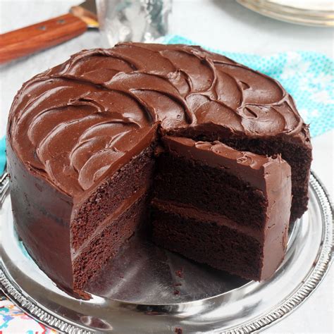 Chocolateycake2 - 2. Stir together sugar, flour, cocoa, baking powder, baking soda and salt in large bowl. Add eggs, milk, oil and vanilla; beat on medium speed of mixer 2 minutes. Stir in boiling water (batter will be thin). Pour batter into prepared pans. 3. Bake 30 to 35 minutes or until wooden pick inserted in center comes out clean.