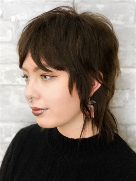 A pixie mullet is a bold, piece-y haircut with layers cut shorter from