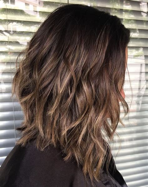 Dye the top and fringe in a blonde hue and keep the back hair in its natural dark color. 6. Short-Stacked Waves. If you want a messy look, this short choppy brown hair is the perfect choice for you. Use …