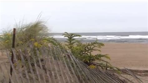 Choppy waves attract beachgoers to Plum Island as storm Lee heads east