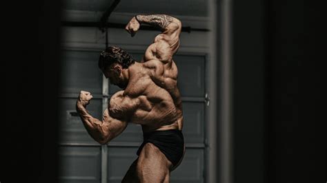 th?q=Chris Bumstead Puts Size on His Delts With Intense Shoulder Workout