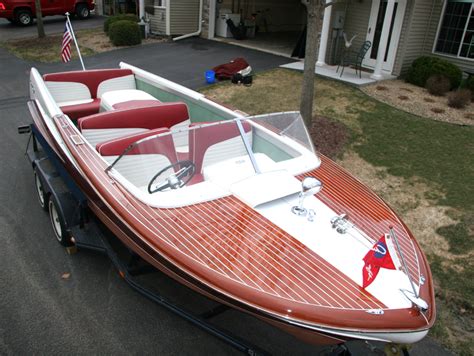 I am looking for a source for Helm seats. Preferably in White with the Chris * Craft embroidred into them? A good picture of what I am wanting its shown in Fall 2007 …. 
