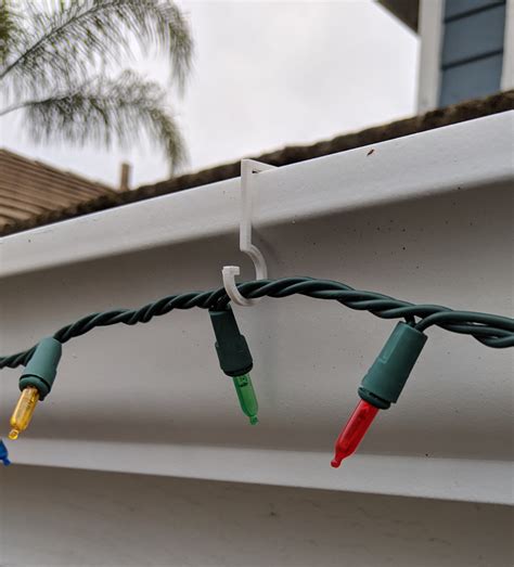 Christmas light hangers for gutters. Christmas Light Clips Gutter Hangers S Clips Weatherproof Plastic Clips for Christmas Holiday Outdoor Decoration Rope String Lights (216) 4.3 out of 5 stars 179. ... New Traditions Simplify Your Holiday Christmas Light Clips for Gutters & Shingles, Holds C7 & C9 Christmas Lights, LED Mini Lights, Rope Lights, Outdoor Decorations - Pack of … 