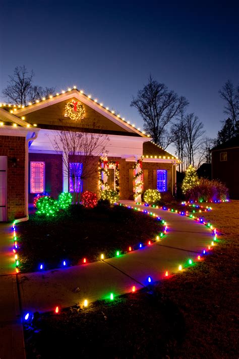 Christmas light installers. We offer warm white and a selection of colored lights to choose from. We can light up the house, bushes, trees, columns, and more! 2. Installation. Install times start in October, and book up fast. Our professional grade Christmas lights are custom cut to fit your home perfectly. The extension cords are custom lengths and well concealed. 