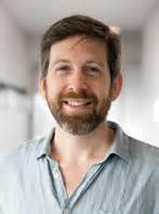 Christopher M. Moreman is Associate