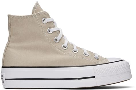 On the Chuck Taylor high top basketball style sneaker, the logo is on the inside. On most other styles of Converse shoes, sneakers and boots, the logo is on the outside of the shoe.... Chuck taylors on sale