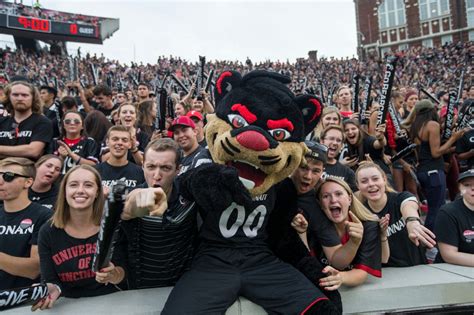 Bring your fan cave to the next level with our Cincinnati memorabilia. And while you're at it, help your friends and family get on your level of fanhood by hooking them up with our Cincinnati Bearcats gifts. All it takes is some of our Cincy gear to prove you're the ultimate Bearcats fan in Ohio. Read More..
