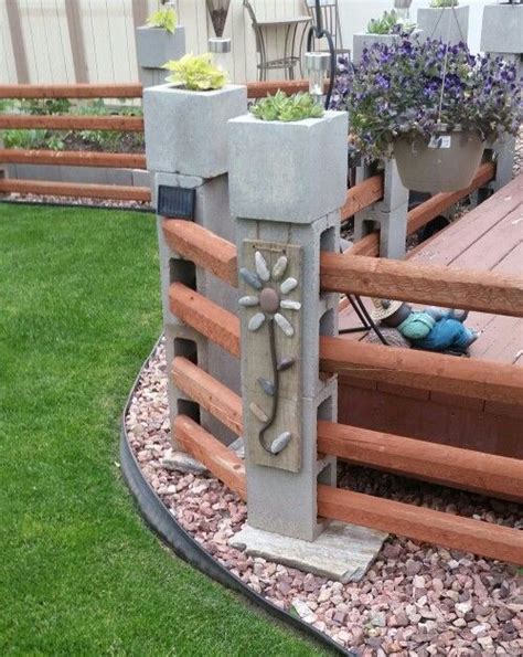 Cinder block fence ideas. The easiest example is the one in which the blocks function as the posts that hold the wood rails that are inserted through the holes of the blocks, as you can see in the picture above. 2. Both of Cinder Block and Wood Are Suitable for Outdoor Environment. cinder block base for a wooden fence. image via pinterest.com. 