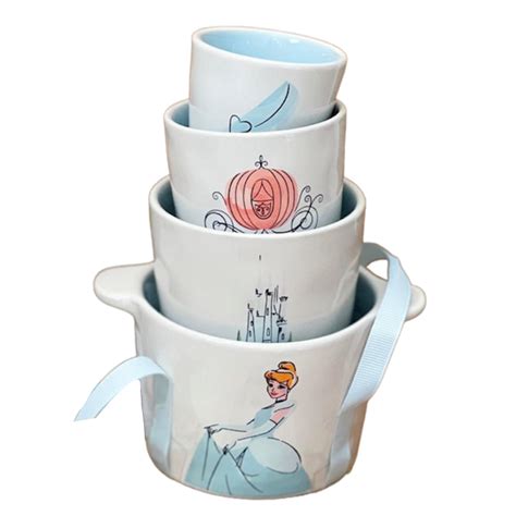 Brand new Rae Dunn Disney Princess Cinderella Double sided Measuring Cups. Featuring Princess Cinderella, Mice and Blue Bird. Set of 4 double sided ceramic …. 