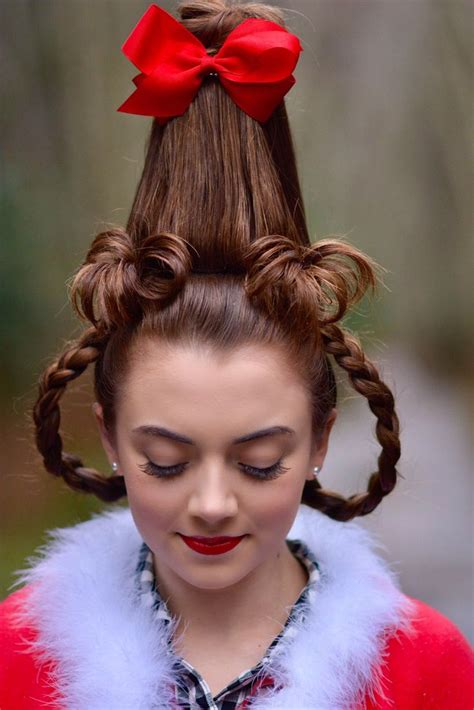 Cindy-Lou Who is one of Dr. Seuss’ most iconic characters not only for her role in helping transform the Grinch’s view of Christmas, but also for her hairstyle in 2000 blockbuster movie. To create the style: Section off a portion of your child’s hair at the top of their head and secure it to the side with a clip. 