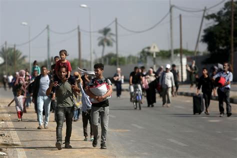 Civilians fleeing northern Gaza’s combat zone report a terrifying journey on foot past Israeli tanks