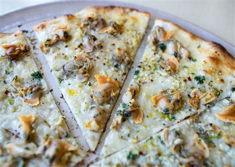 Clam pizza. Cheese or no cheese is the pivotal question. The Italian rule is never to eat cheese with seafood. And it's a good rule. Cheese — especially mozzarella — ... 
