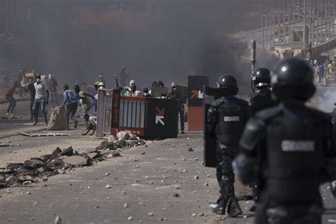 Clashes in Senegal kill at least 9; government bans social media platforms and closes university