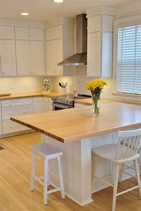 Classic White Shaker Kitchen with Butcher Block Countertops