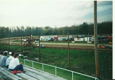 Clay city raceway. In the turns there was 9-10 feet of dirt placed to bring the banking to 19 degrees. Along the front and backstretch there will be 1-2 feet of dirt and about a foot of dirt in some of the smallest ... 
