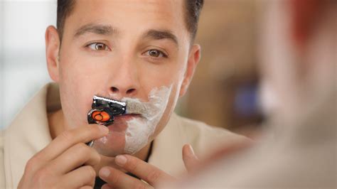 Clean shave. For daily shaves, first shower to soften your beard to a manageable level of toughness. The first time you shave, you will have to trim down your stubble first before your shower. Then apply your lather (preferably with brush & cream/soap for best results). Shave one pass WITH the grain. 