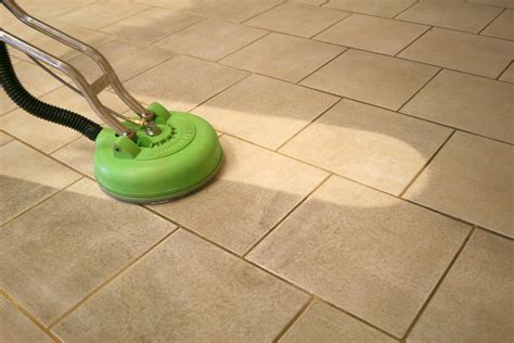 Clean tile grout. After completing a section, use a dry microfiber mop or dry microfiber cloth in the same pattern to dry the floor. This prevents streaking. Repeat until the entire floor is clean. Change your mop ... 