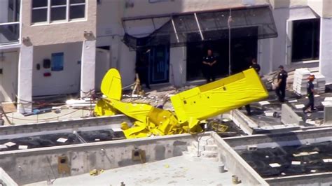 Clean-up begins after banner plane crash kills experienced pilot