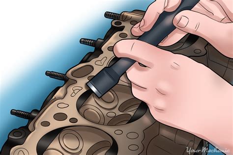 Cleaning cylinder head mating surface.  Remove all gasket material and carbo...