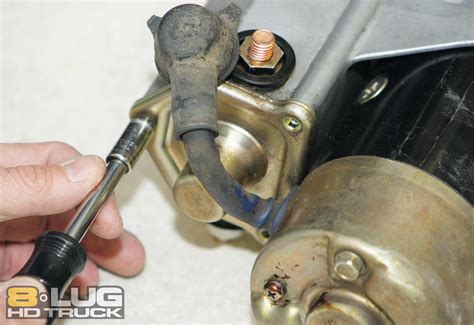 Cleaning starter solenoid contacts.  Remove the solenoid from the starter assembly...