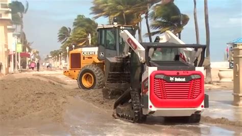 Cleanup crews work to reopen businesses  after heavy winds impact Hollywood Beach