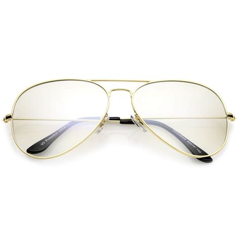 Clear lens sunglasses. Modified rectangular clear lens glasses with a sleek thin frame that provides a clean sophisticated look. Made with an acetate based frame, metal hinges, ... 