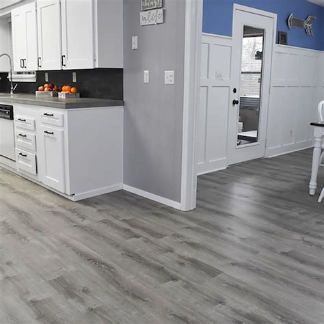 Home Decorators Collection. Wellington 3/8 in. T x 5.1 in. W Hand Scraped Strand Woven Engineered Bamboo Flooring (19.2 sqft/case). 