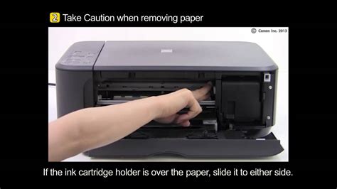 Clearing a Paper Jam inside the Top Cover - Canon