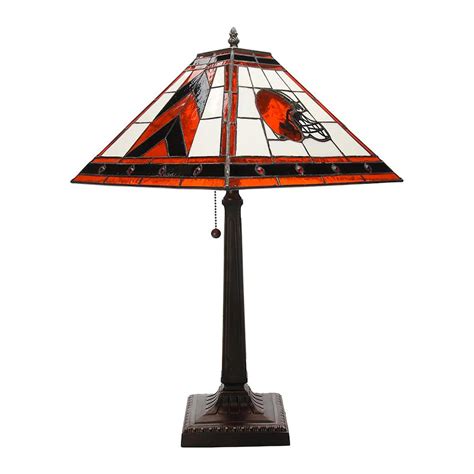 features team color, antique textured float glass with full team name silk screened on each of the side panels. The team logos are also silk screened on panels before the team name and after. This lamp provides a unique way to show off your team spirit as well as light up a room! 