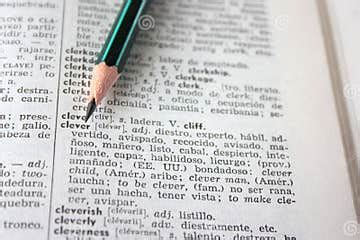 Clever Word in EnglishSpanish Dictionary Stock Photo Image of text