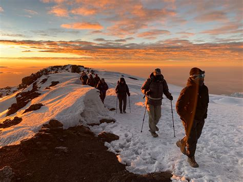 Climb mount kilimanjaro. Climbing Kilimanjaro is like hiking from summer to winter in a matter of days. Your apparel will reflect this as well. You will need technical clothing such as a waterproof jacket, fleece jacket and several baselayers. Cold weather gear such as hats, gloves, down jacket, and a warm sleeping bag are essential. 