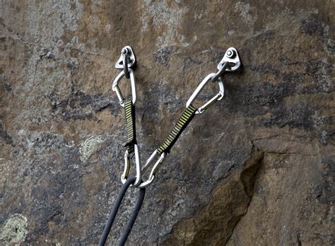Climbing anchor chains.  The bottom loop has a twist so that it girth hitches cleanly to a cli...