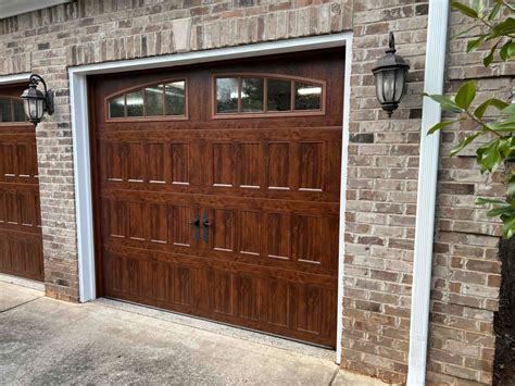 Clopay doors. These doors have one-layer steel construction, long-life nylon rollers, and a replaceable weather seal along the bottom. They cost from $450 to $1,400. The average-price line at Clopay includes the Coachman garage doors. Coachman doors have four-layer steel construction with R-Values ranging from 6.5 to 18.4. 