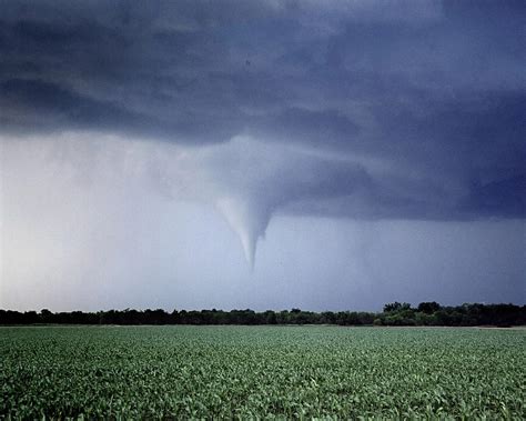  A funnel cloud is a funnel-shaped cloud of condensed water droplets, associated with a rotating column of wind and extending from the base of a cloud (usually a cumulonimbus or towering cumulus cloud) but not reaching the ground or a water surface. 