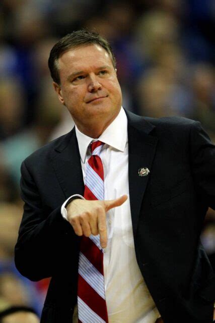 American. Bill Self is a basketball coach who has
