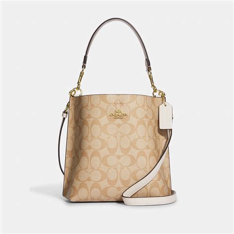 Coach bucket bag outlet. Coach Outlet Mini Dempsey Bucket Bag In Signature Jacquard With Stripe And Coach Patch - Multicolor. $278 $129.01 (54% off) Coach Outlet. Sale. 
