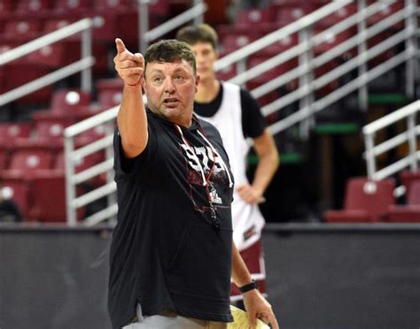 Basketball coach Greg Heiar said he was fired because New Mexico State needed a "sacrificial lamb" after a series of incidents, including hazing allegations.. 