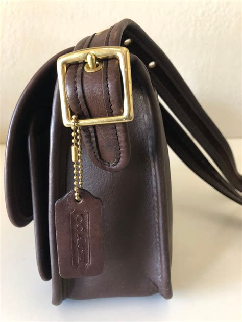 To determine whether a Coach handbag is authentic, examine the stitching, placement of the fabric and the interior of the bag. Coach handbags are made from high-quality materials and often feature a serial number to assist in authenticating.... 