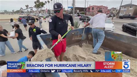 Coastal residents fill sandbags as Hurricane Hilary approaches Southern California