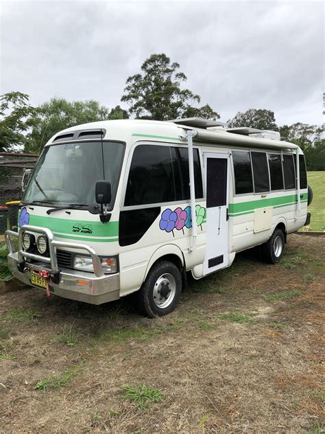 21 seat deluxe Toyota Coaster - auto. Buses + 4WD only supply the
