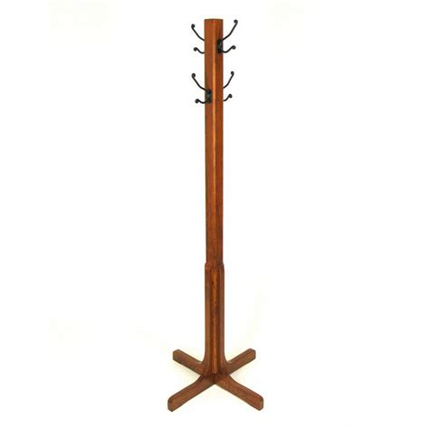 Shop Linon Traditional Walnut Wood Coat Stand with 4 Hooks and Split Top Seat in the Coat Racks & Stands department at Lowe's.com. Keep your mud room or entryway neat and tidy with this beautiful and unique hall tree with storage bench. Spacious seating area flips up to reveal a large