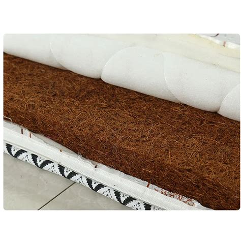 Coir mattress. Brown coir is also used in formation of door mates. Brown coir is also used in manufacturing of mattresses. Coir fiber is also used in auto mobiles. Geo-textiles made from coir mesh (at left) are durable, absorb water, resist sunlight, facilitate seed germination, and are 100% biodegradable. 