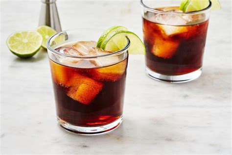 Coke and rum cocktail. Directions. Divide the cherry juice and rum between 2 glasses. Stir to combine and add ice. Top each glass with cola and garnish with a cherry. 