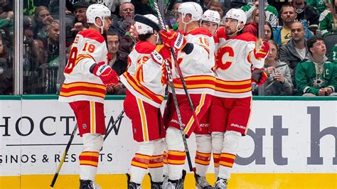 Coleman and Lindholm ignite 4-goal 3rd period for Flames in 7-4 win over Stars