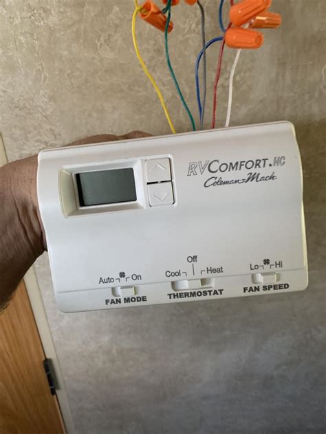 I swap out my OEM Coleman Mach manual slider type thermostat for a battery-operated Honeywell RTH5100B digital with auto heat and cooling changeover. I’ve done this particular upgrade a few times in the past. First I upgraded to a Hunter 42999B and then to a Honeywell Focus Pro 5000 series.. 