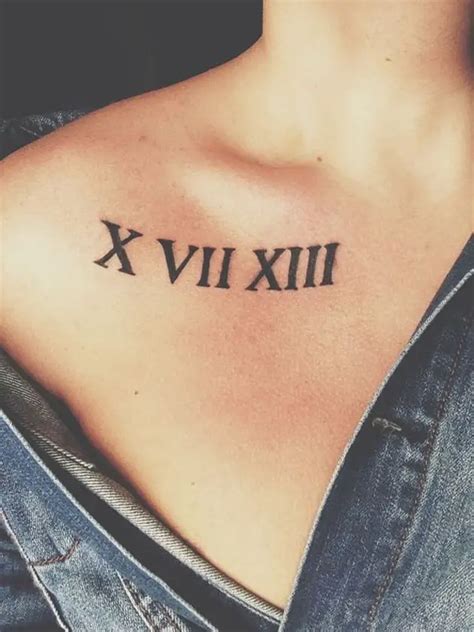 3. Impressive Roman Numerals Tattoo On Chest: This is an eye-catchy tattoo design depicted on the collar bone of the lady where along with the date in Roman numeral, her name is sketched in a flowing font lending a fantastic look to the wearer’s persona. 4. Remarkable Roman Numeral Tattoo Design: Save.