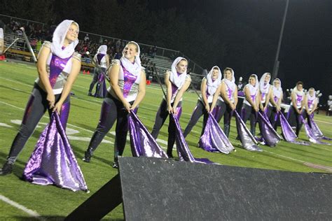 Colorguard is a combination of spinning flags, rifles, and sabers, with dance. We perform with the band during marching season (August-November), .... 